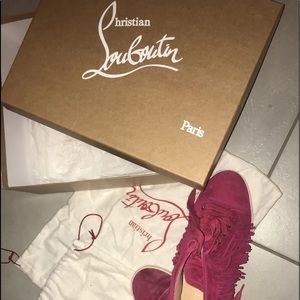 Christian Louboutins (Red bottoms)